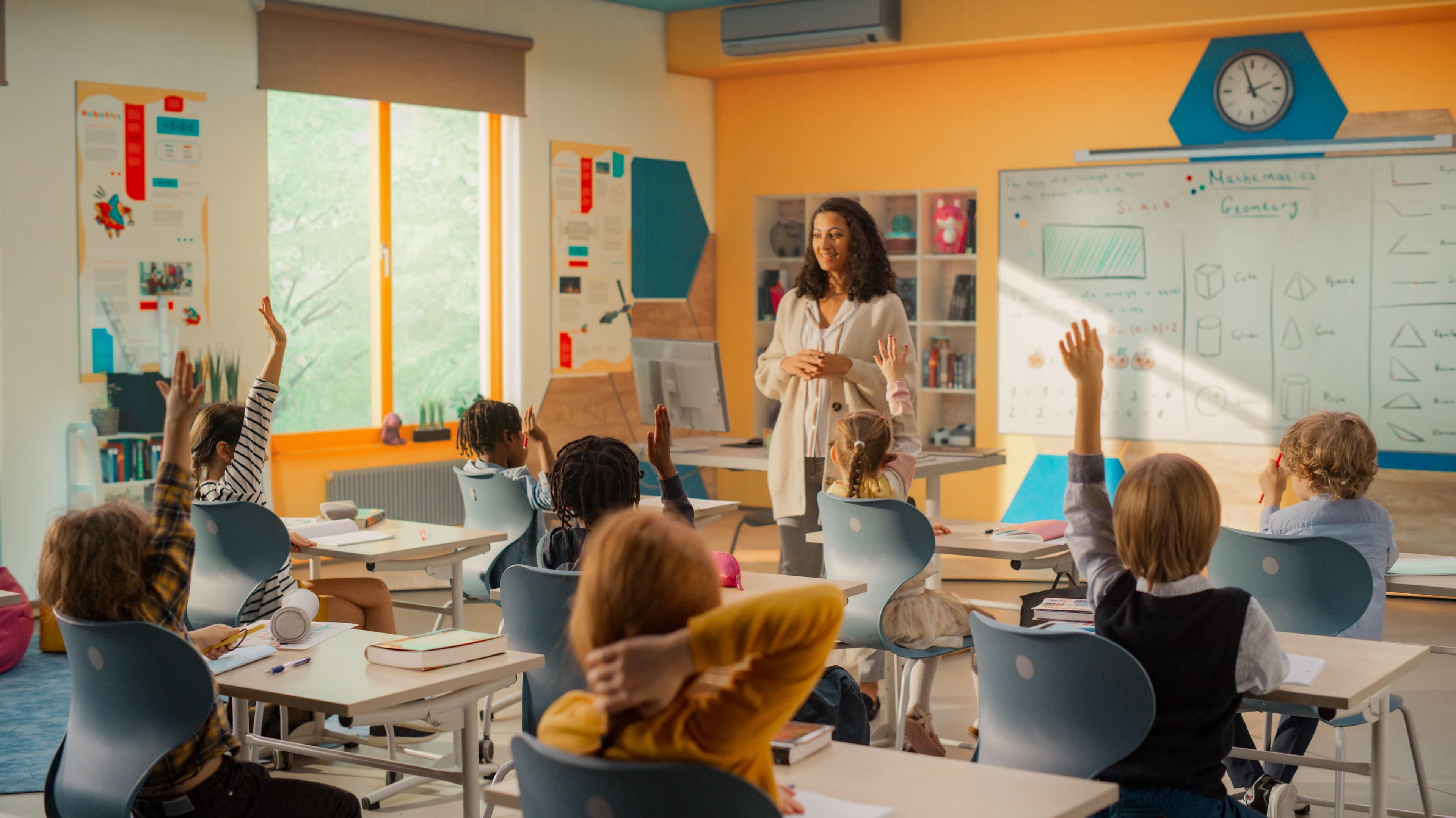 Students reading in a classroom setting.