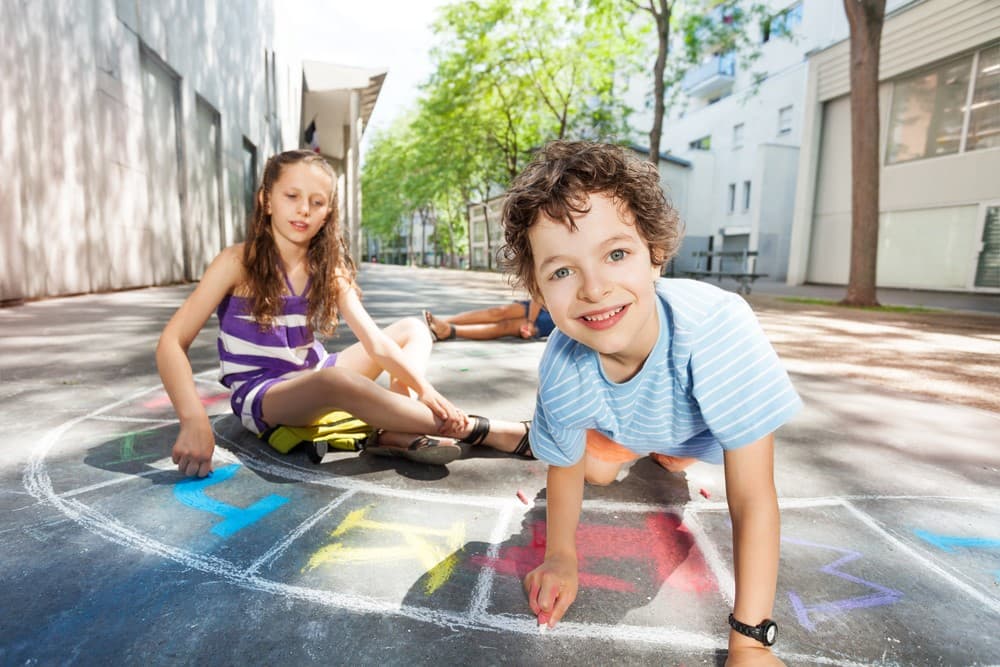 kids playing outdoor homeschool phonics games