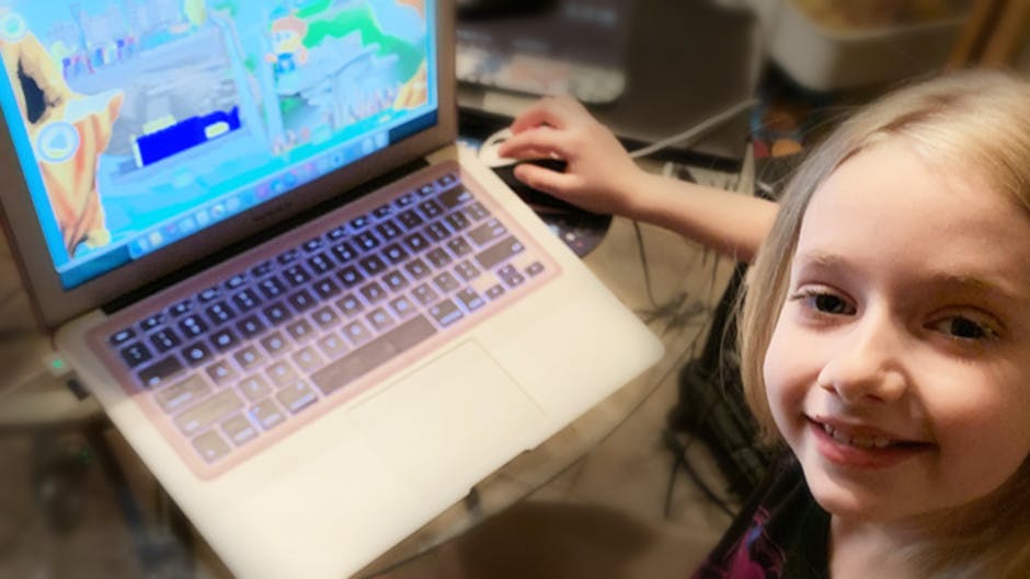 Seven year old school girl with ADHD learning with Reading Eggs online program.