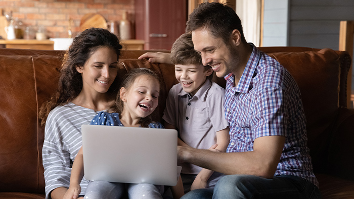 family having fun with online reading game
